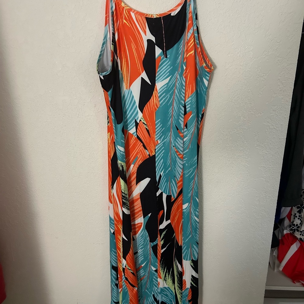 Full length sleeveless summer dress. Great for beach, park, or dinner plans.